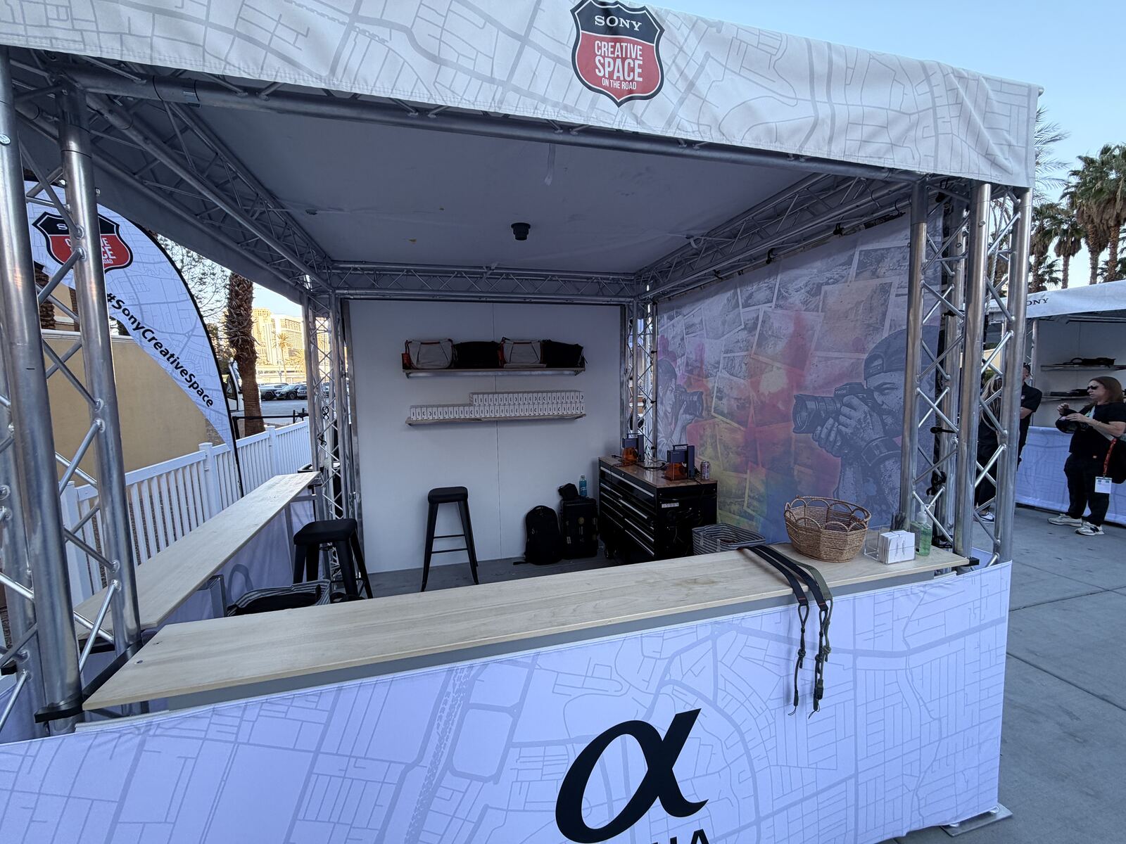 Guests interacting at merchandise display tables during a live activation